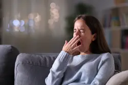How many days a month the average person is tired, has headaches or deals with tummy issues